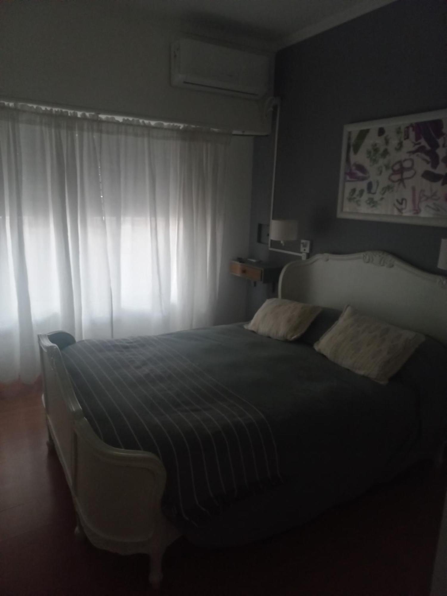 La Biblioteca Apartman Olavarría Szoba fotó