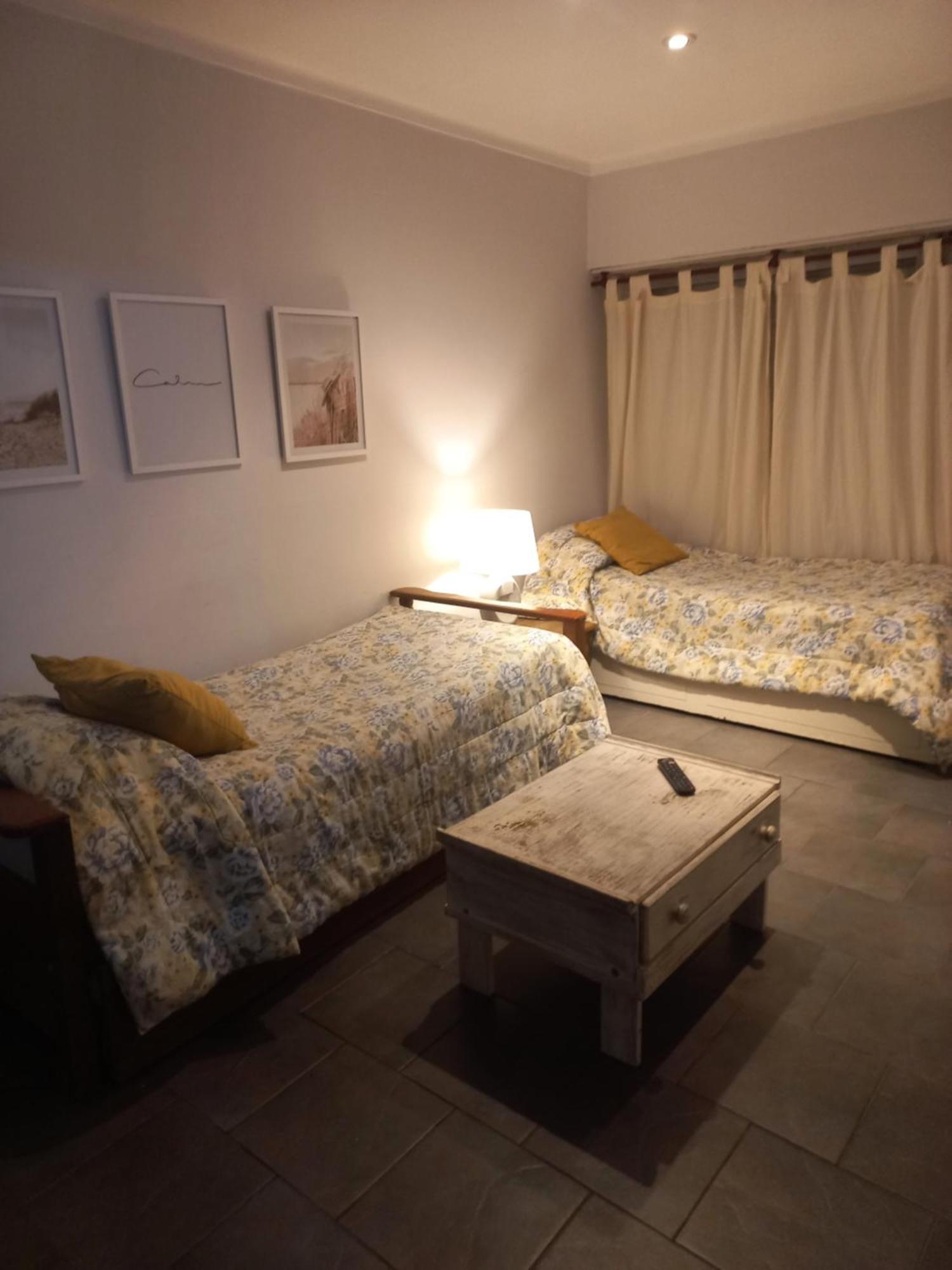 La Biblioteca Apartman Olavarría Szoba fotó